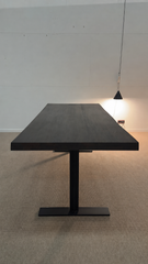 Michel Denolf LARRY Dining Table Made of Charred Chestnut Wood, on Display