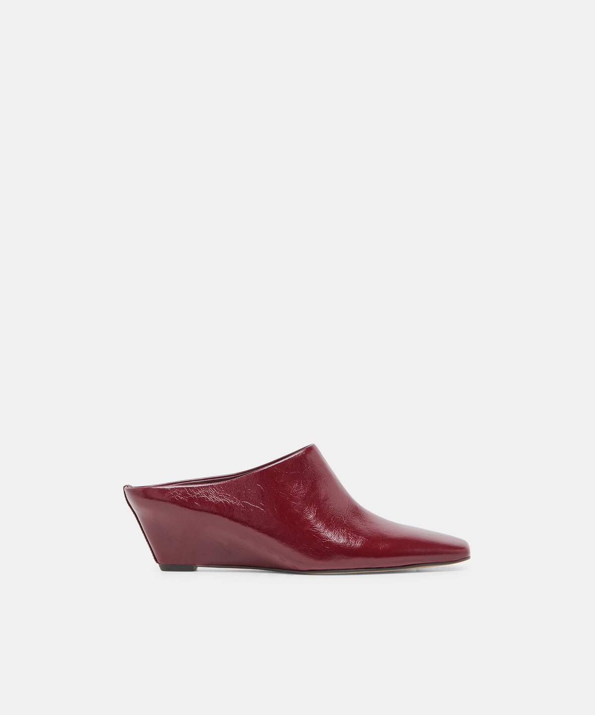 HILAH Oxblood Crinkle Patent Closed-Toe Slip-On Wedge Mules | Dolce Vita
